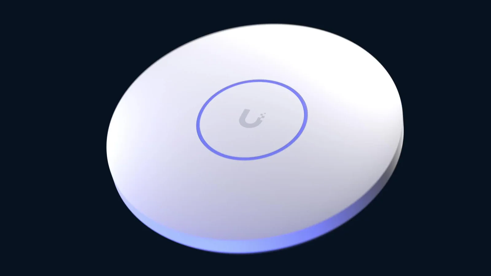 UniFi ceiling-style access point with its blue status light illuminated.