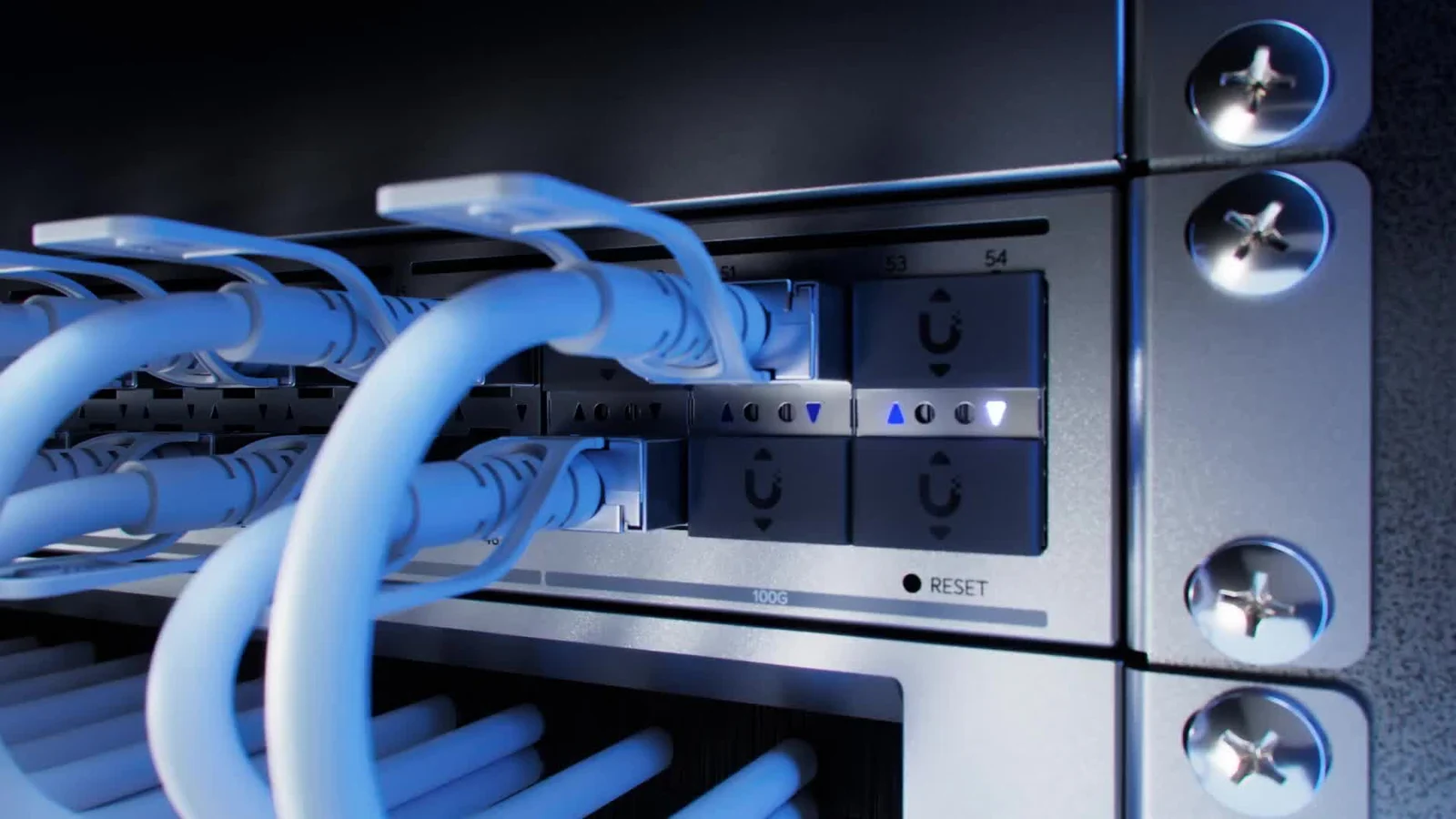 Close-up of Ethernet cabling connected to UniFi rack equipment.